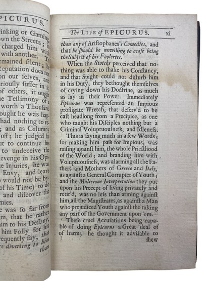 a rare 1712 English edition of Epicurus’s Morals, translated by John Digby and printed for Sam. Briscoe, presenting Epicurean philosophy, moral maxims, and the Wise Man sayings, including the Letter to Menoeceus, Saint-Évremond’s biography of Epicurus, and Isocrates’ Advice to Demonicus. Based on Diogenes Laertius’ accounts, this early 18th-century translation reflects renewed seventeenth-century interest in Epicurean rational ethics, atomism, and practical moral guidance. The volume features period binding